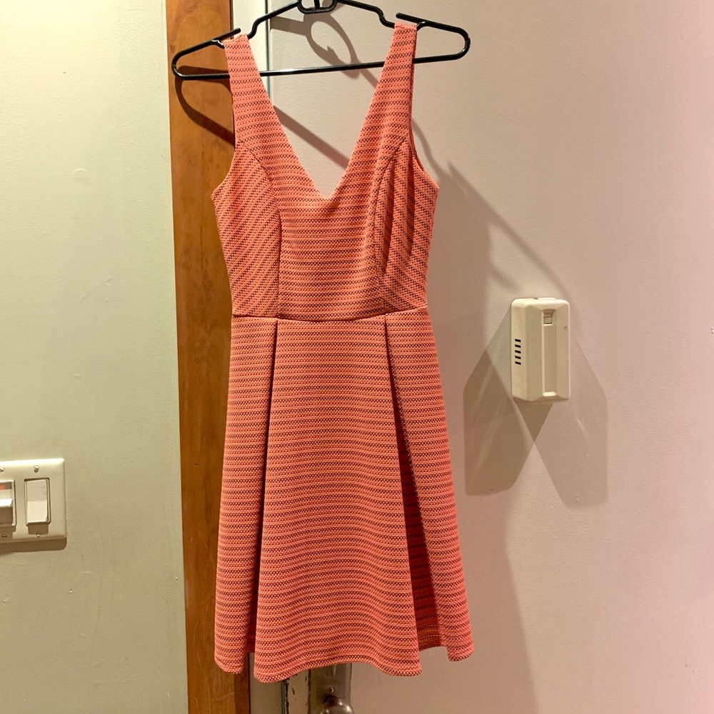 Aqua Bloomingdales. Pink fit and flare dress!